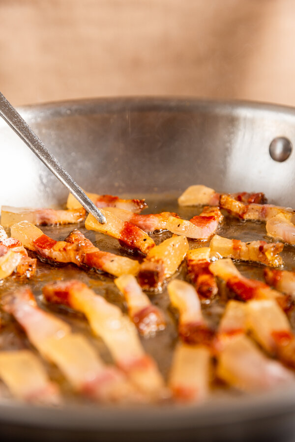 Fry the guanciale in a pan