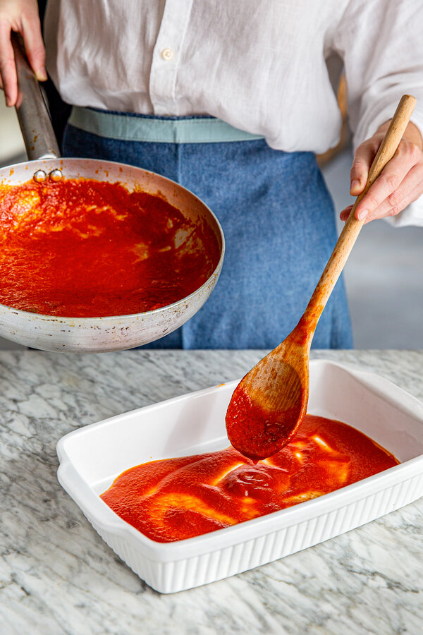 Pour the sauce into the casserole dish