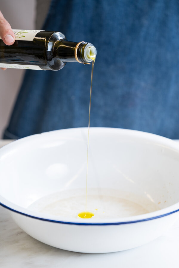 Add olive oil to the water