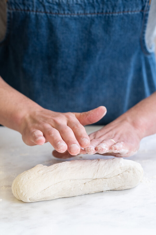Shaping loaves of bread