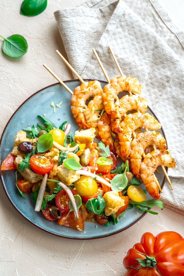 Panzanella with grilled prawn skewers